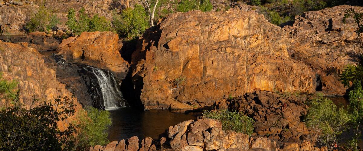 Edith Falls featuring a gorge or canyon, a river or creek and a waterfall
