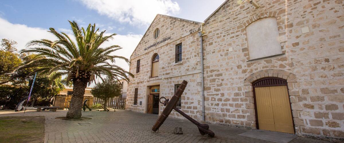 The Shipwreck Galleries showing heritage elements and a sunset