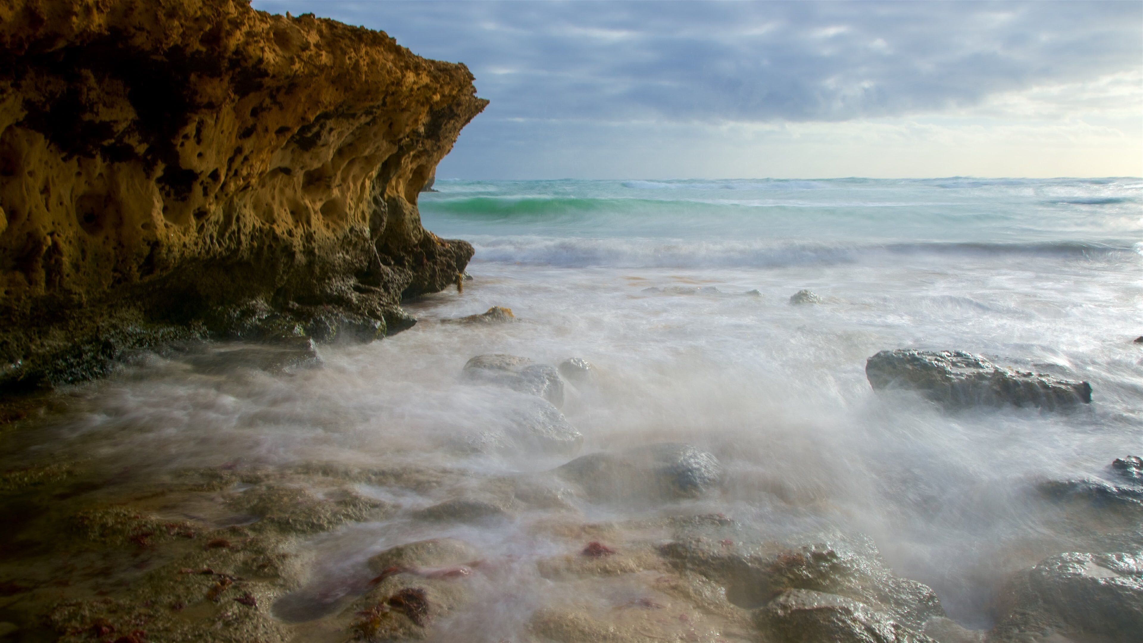 Peterborough featuring surf, a bay or harbour and rugged coastline