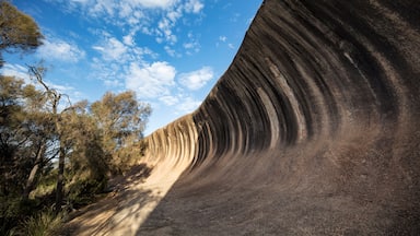 Wave Rock, a 15 metre high natural rock formation that is shaped like a tall breaking ocean wave and is located at Hyden in Western Australia