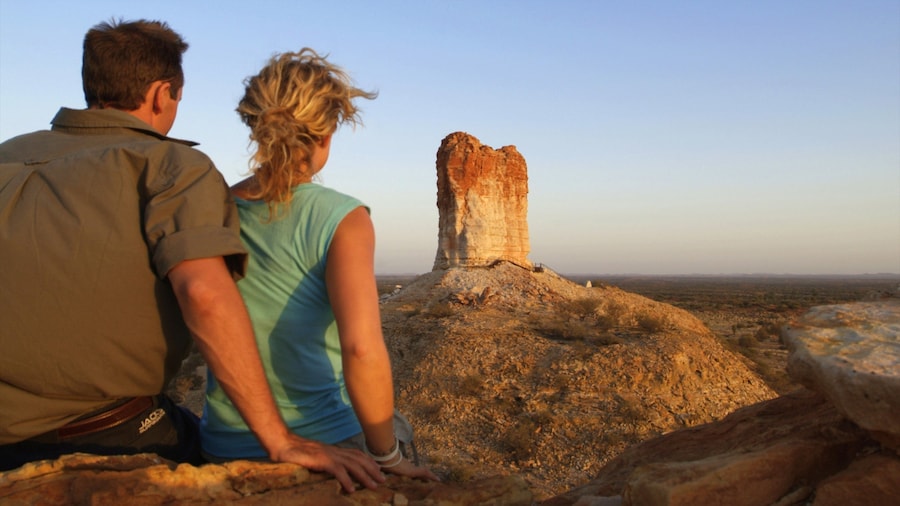 Red Centre which includes a sunset and desert views as well as a couple