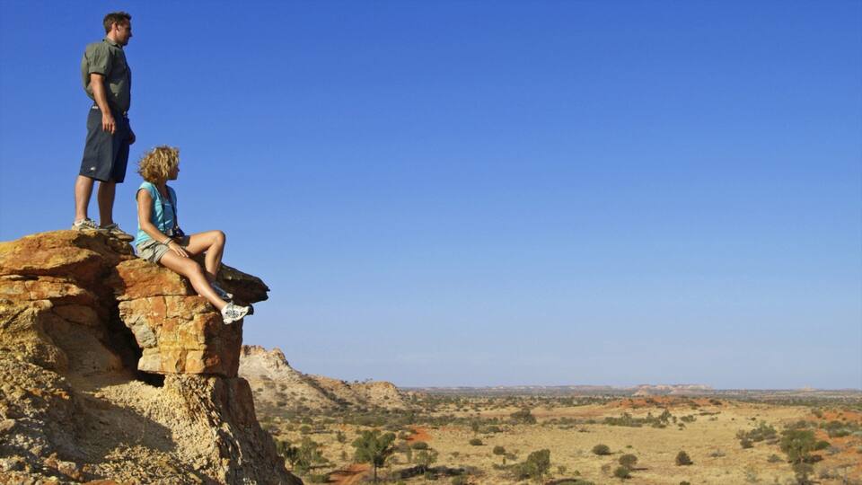 Chambers Pillar which includes tranquil scenes as well as a couple