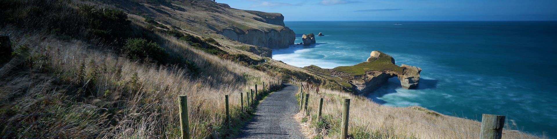 The path down to Tunnel Beach, located in Dunedin, South Island, New Zealand; Shutterstock ID 314211500; Purchase Order: -