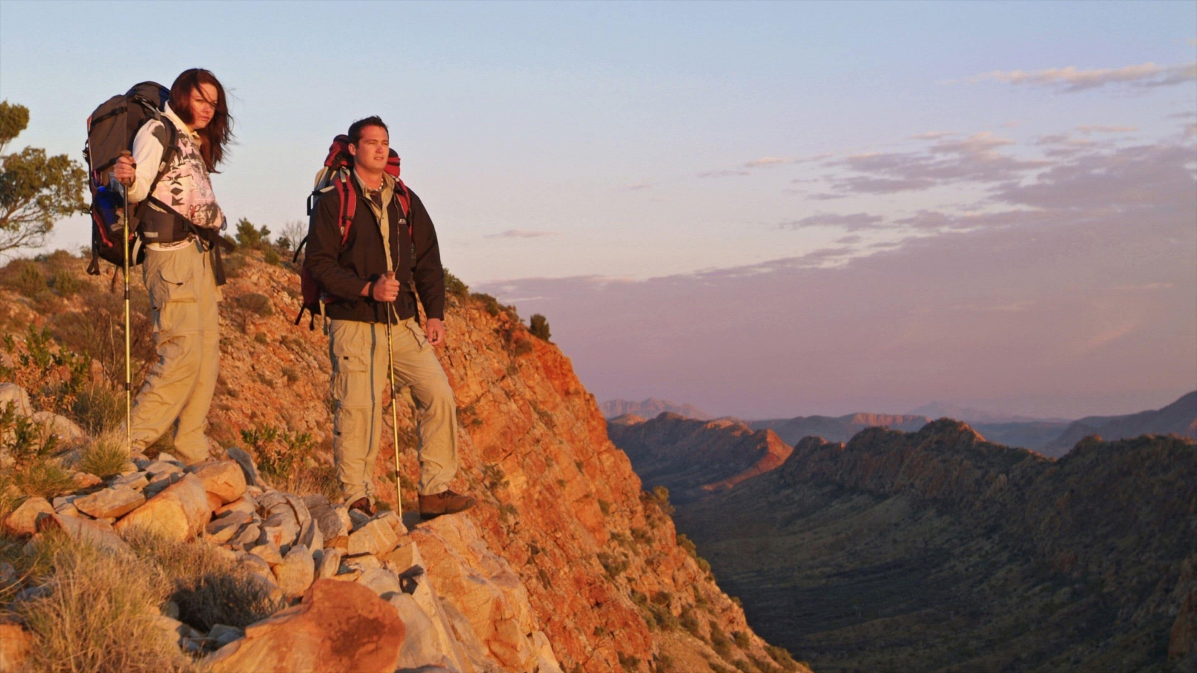 Larapinta Trail featuring a sunset, tranquil scenes and hiking or walking