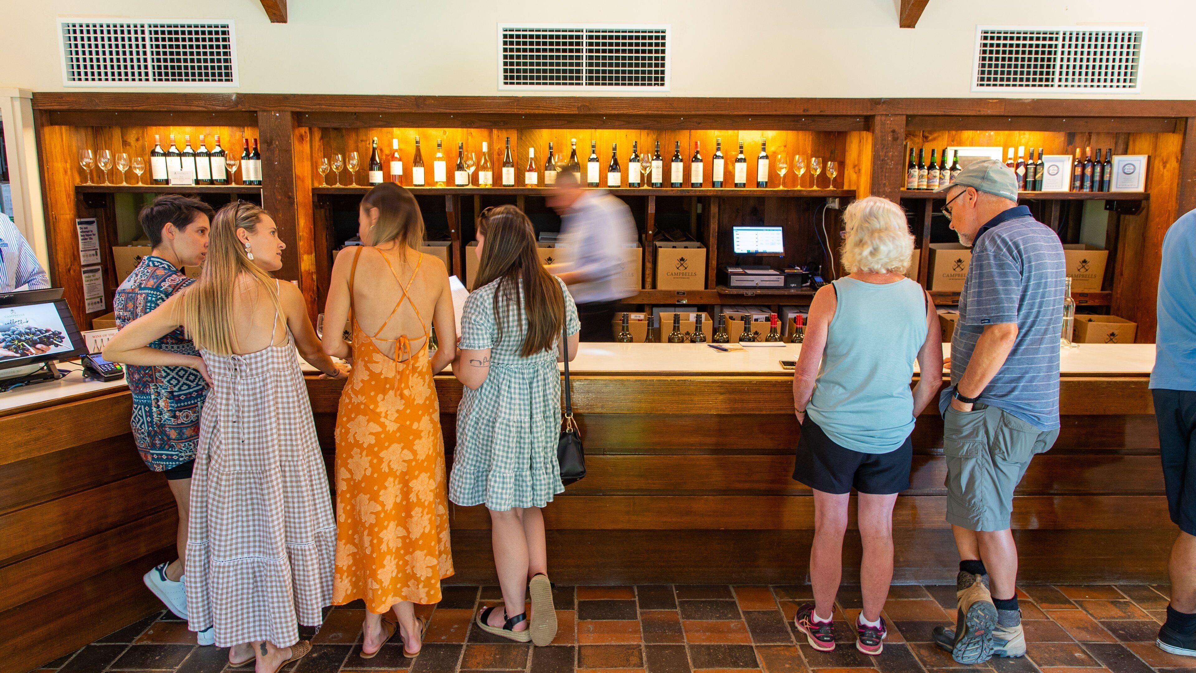 Campbells Winery showing a bar and interior views as well as a small group of people