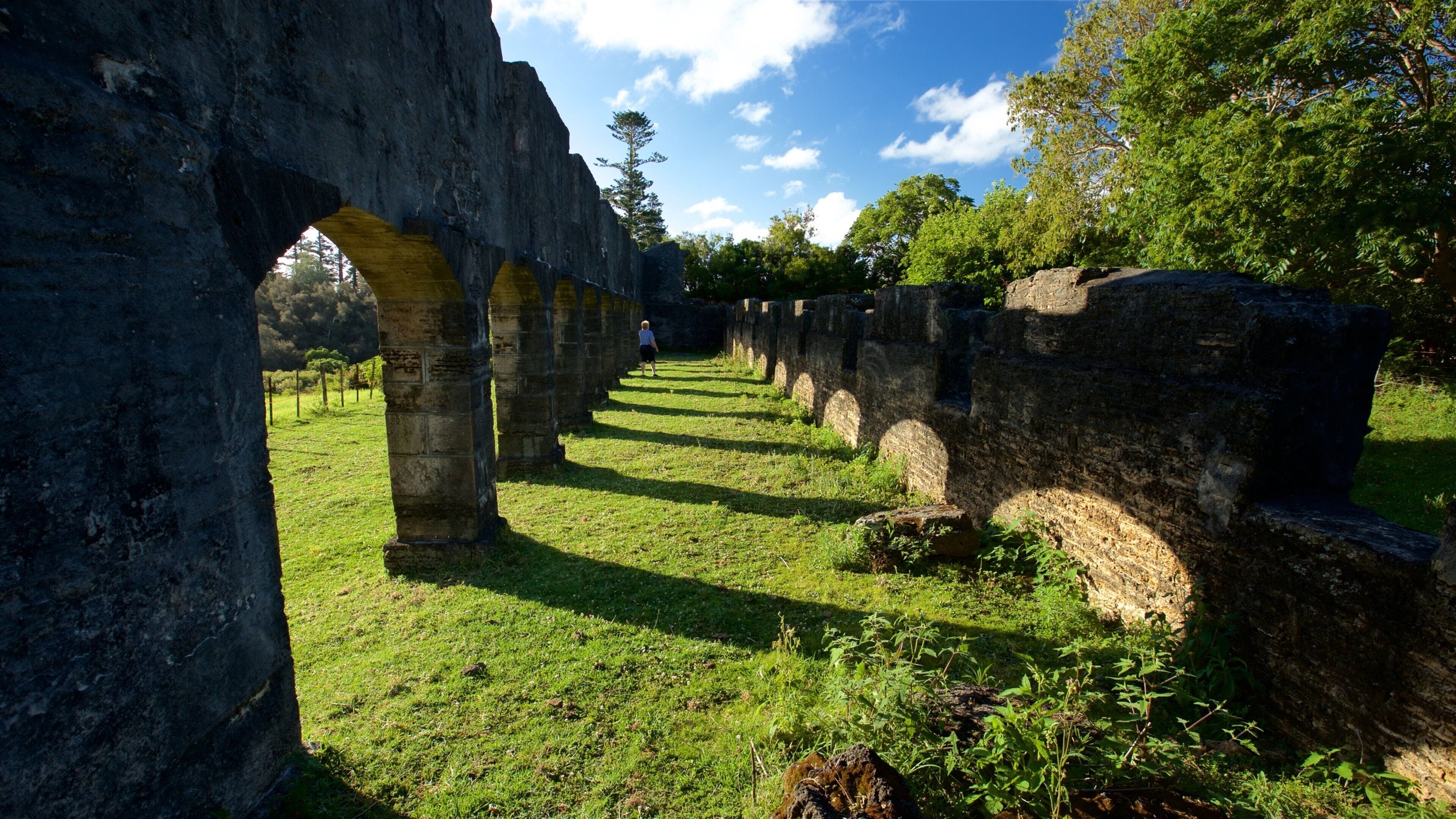 The Arches featuring building ruins and heritage elements