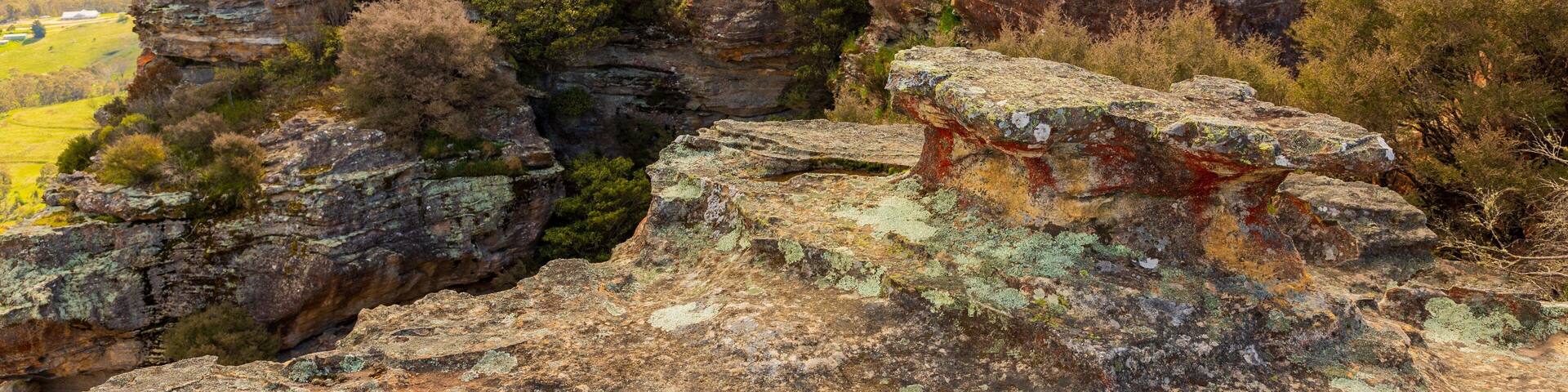 Hassans Wall Lookout which includes a gorge or canyon and tranquil scenes