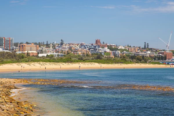 Horseshoe Beach showing a sandy beach, general coastal views and a coastal town