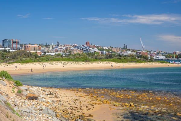 Horseshoe Beach which includes a coastal town, general coastal views and a beach