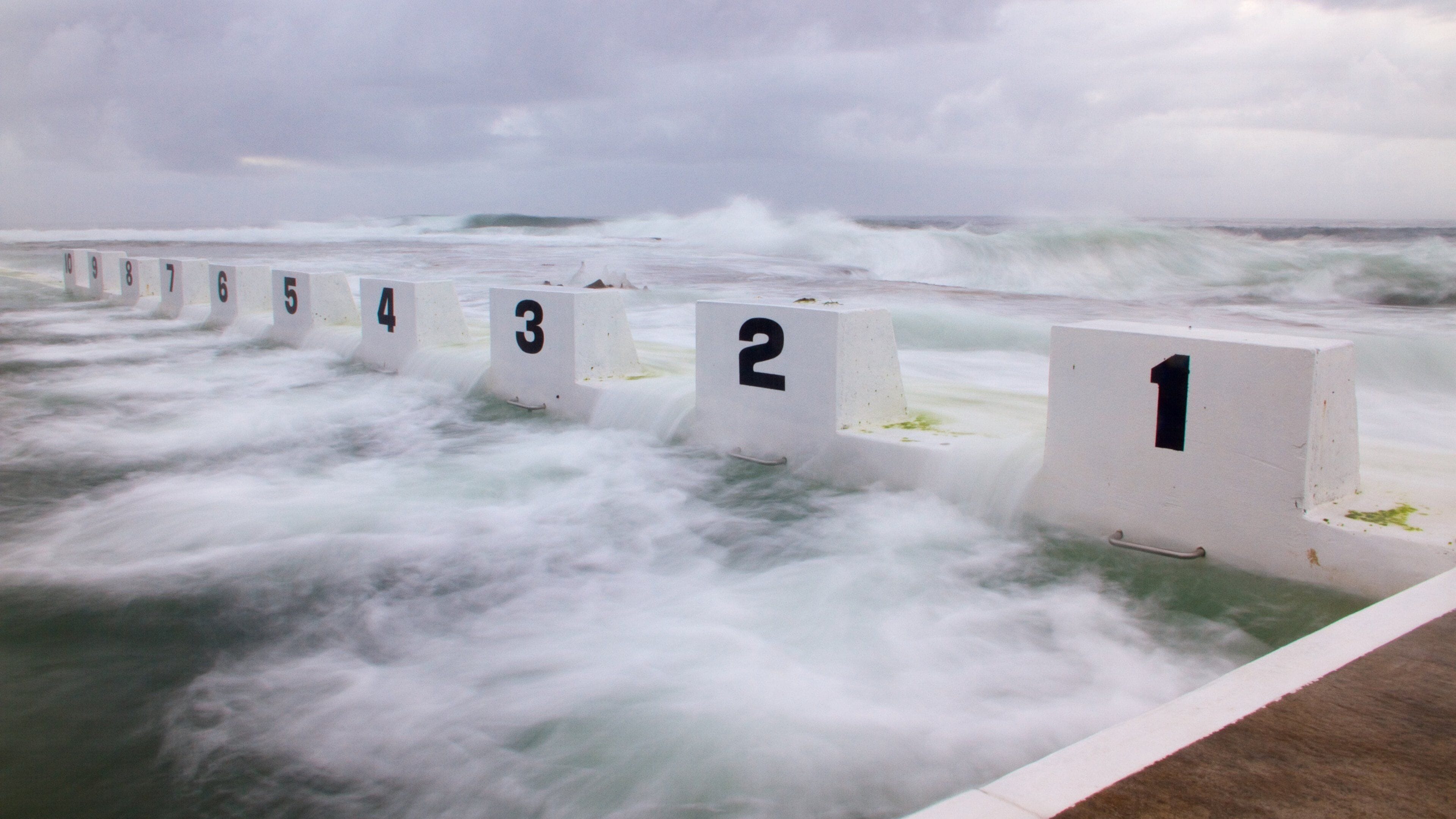 Merewether Ocean Baths showing a pool and general coastal views