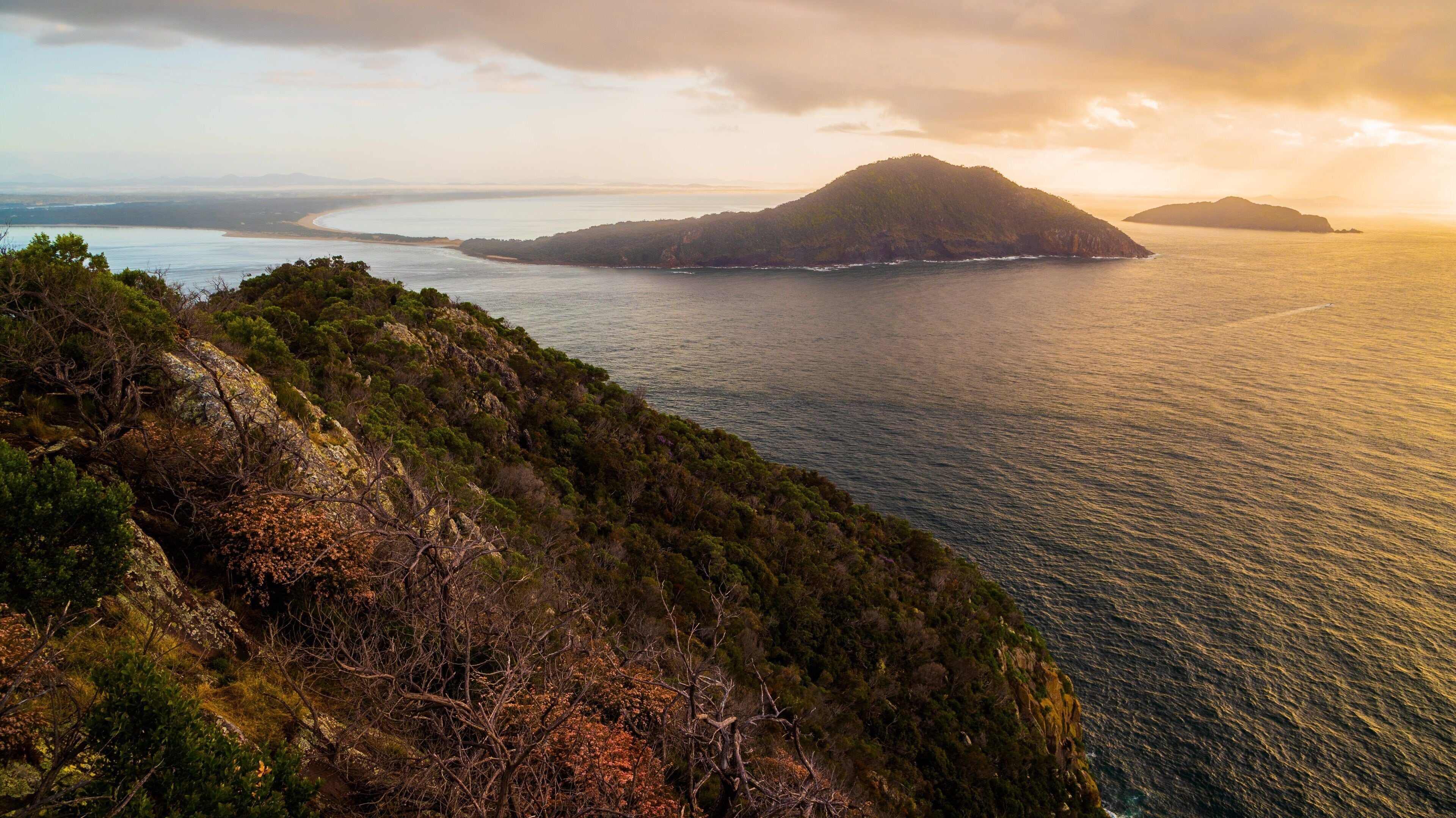 Tomaree Head which includes general coastal views, a sunset and landscape views
