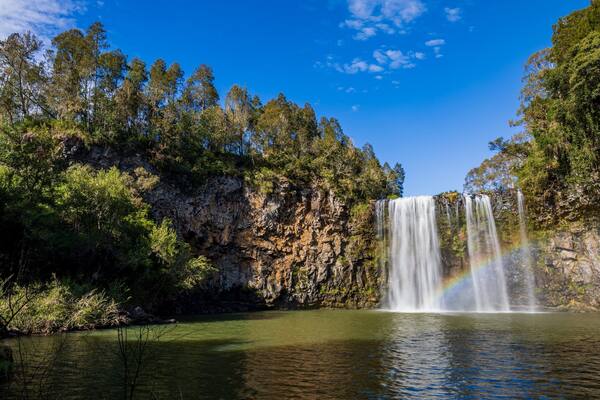Dangar Falls featuring a lake or waterhole and a cascade