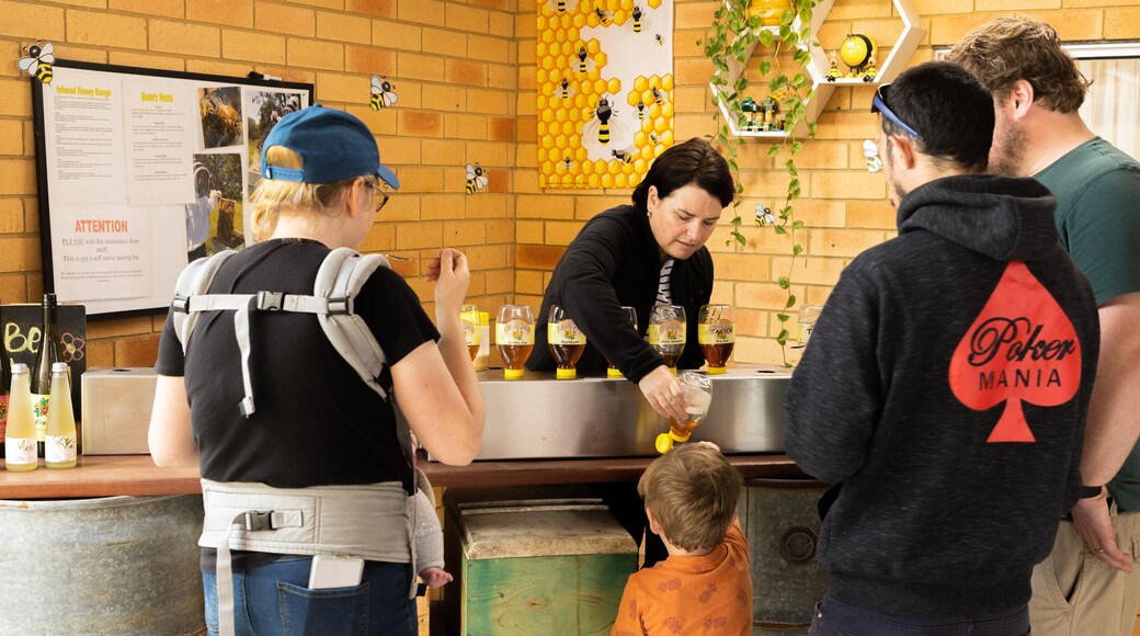 The Honey Place as well as a small group of people