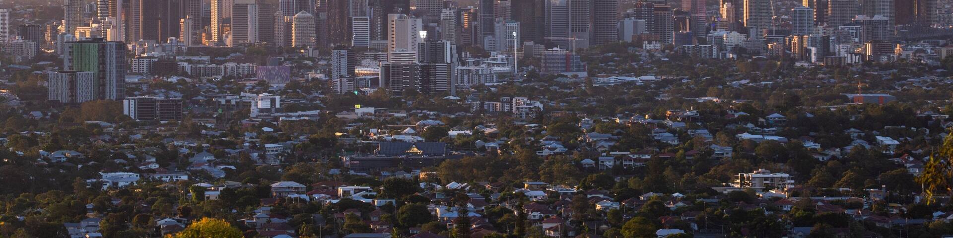 A cityscape with modern skyscrapers and residential areas.