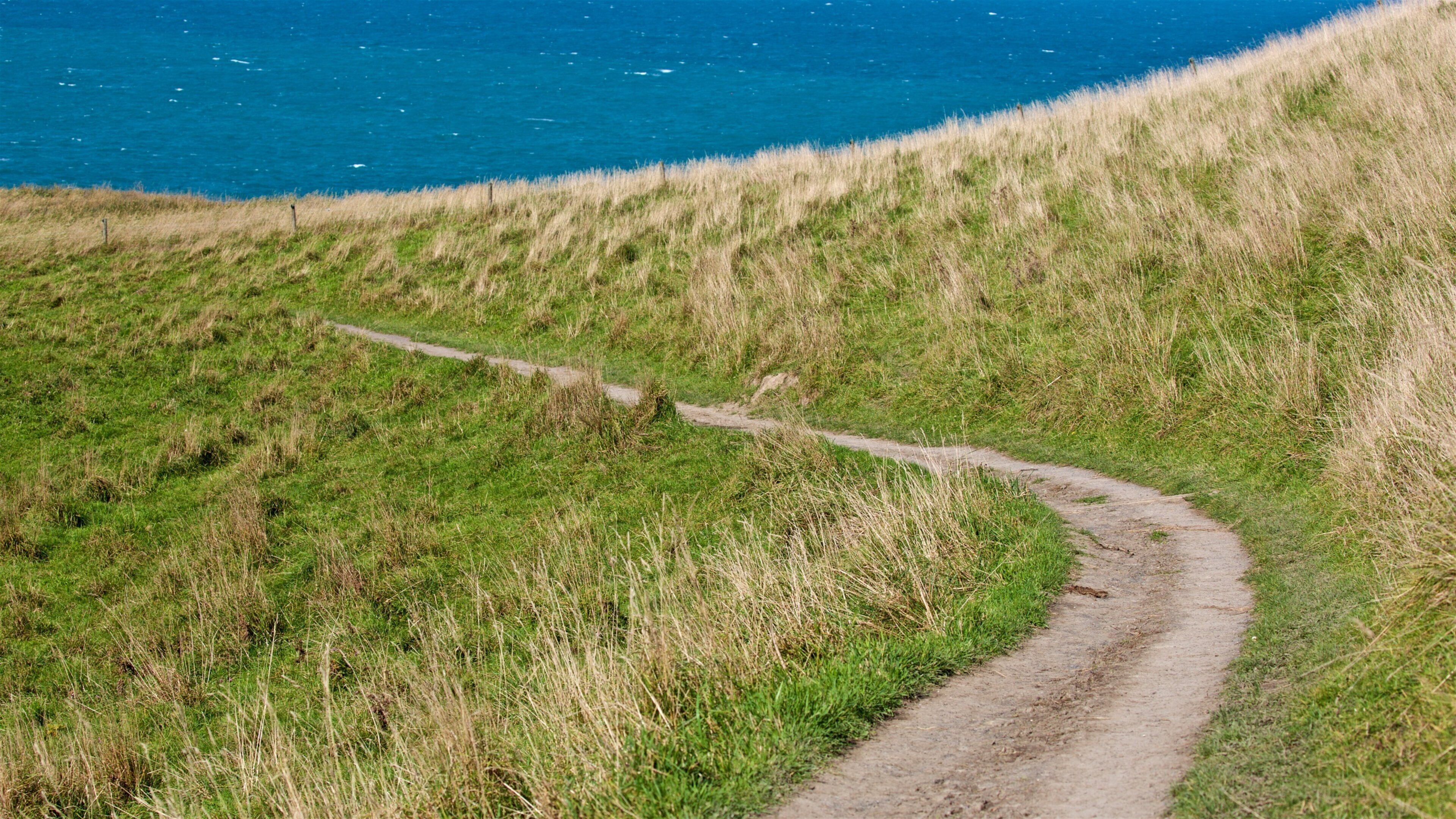 Peninsula Walkway which includes general coastal views