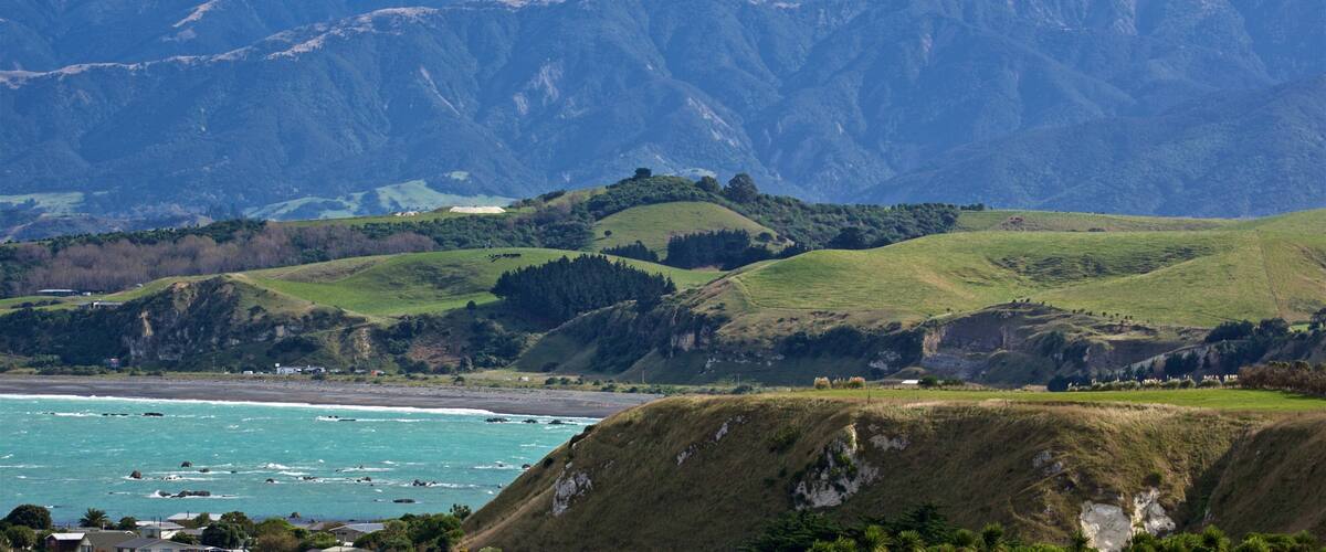 Peninsula Walkway which includes general coastal views, mountains and landscape views