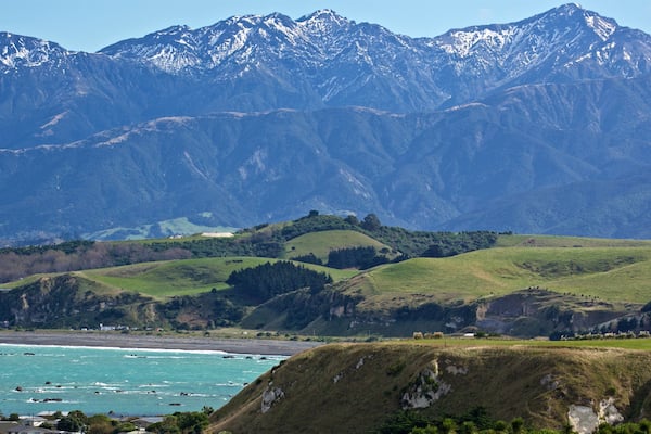 Peninsula Walkway which includes general coastal views, mountains and landscape views