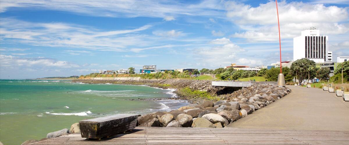 New Plymouth which includes rocky coastline and a bay or harbor