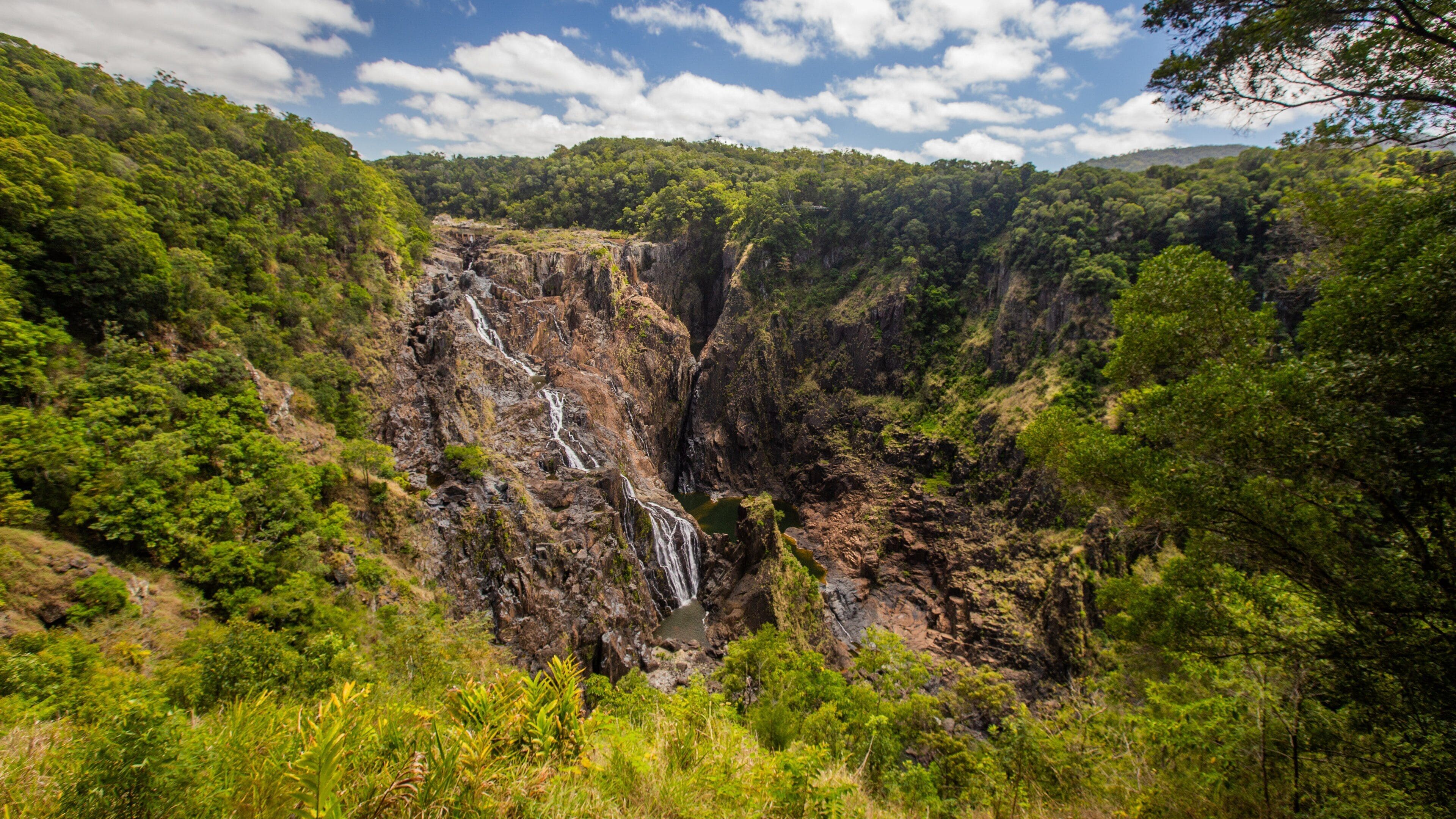 Barron Falls Lookout which includes a gorge or canyon and tranquil scenes