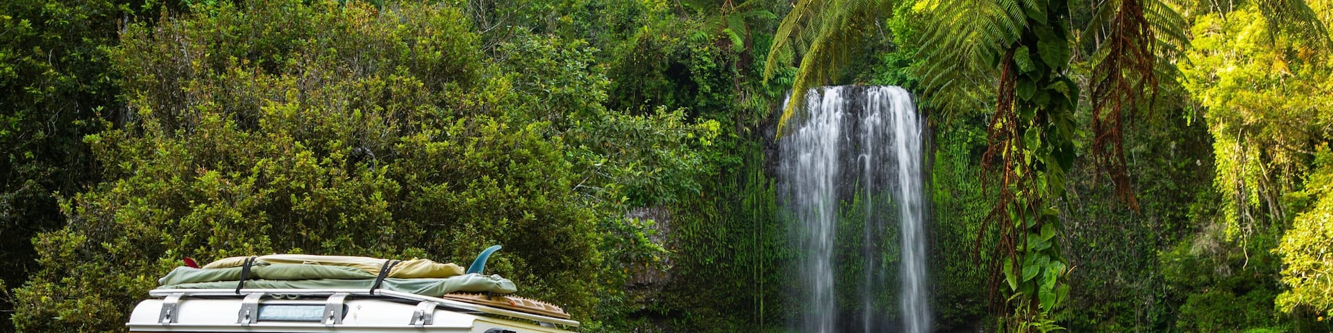 Millaa Millaa Falls which includes a cascade and off road driving