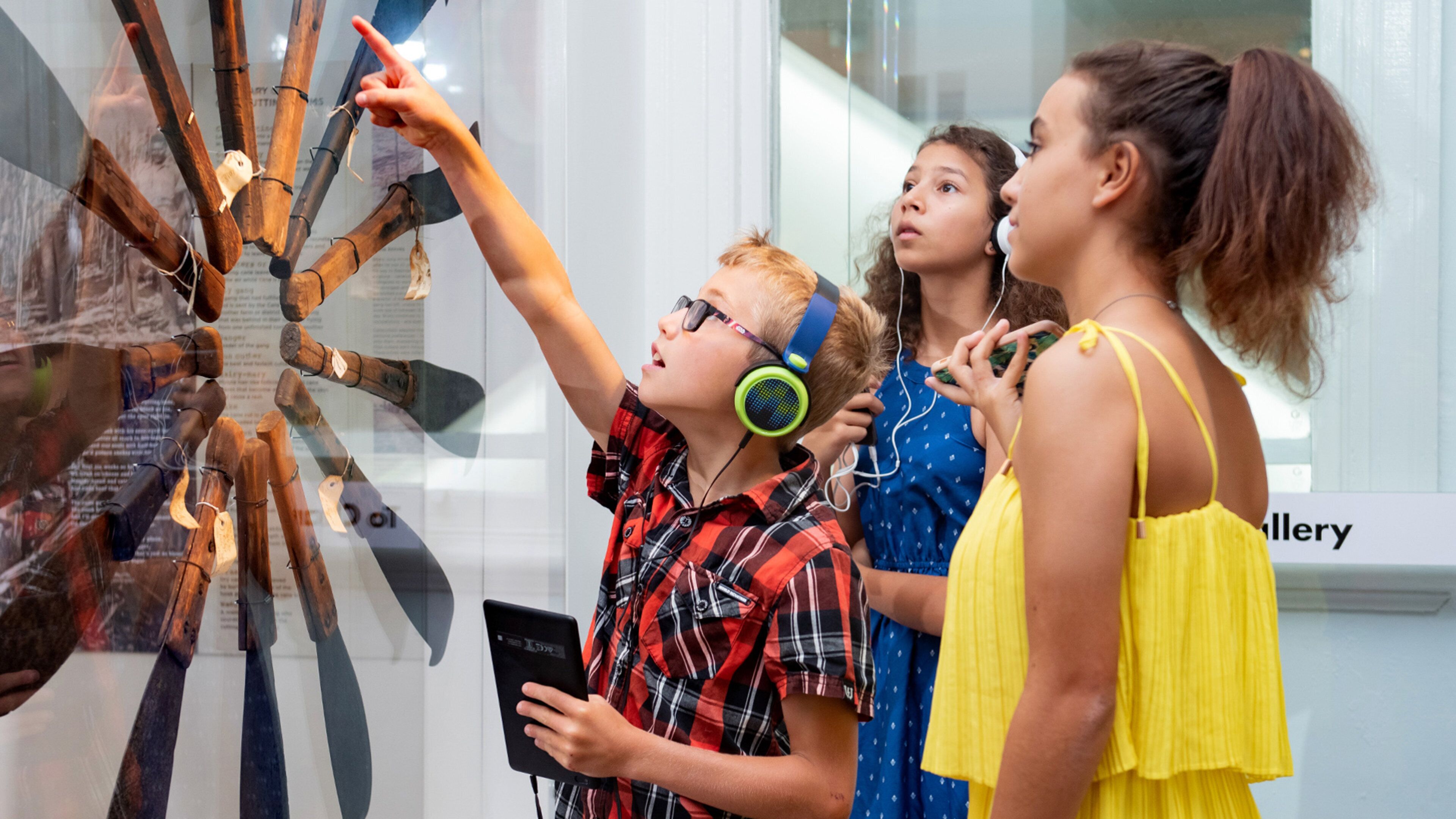 The Cairns Museum featuring interior views as well as children