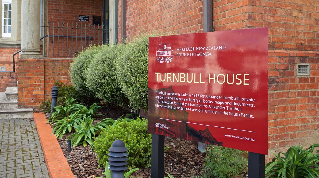 Turnbull House featuring a park and signage