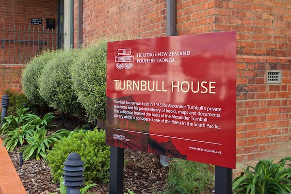 Turnbull House featuring a park and signage