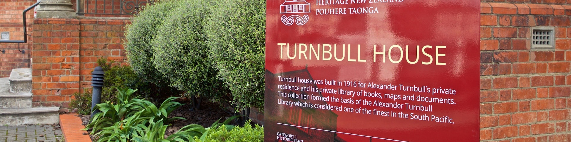 Turnbull House featuring a park and signage