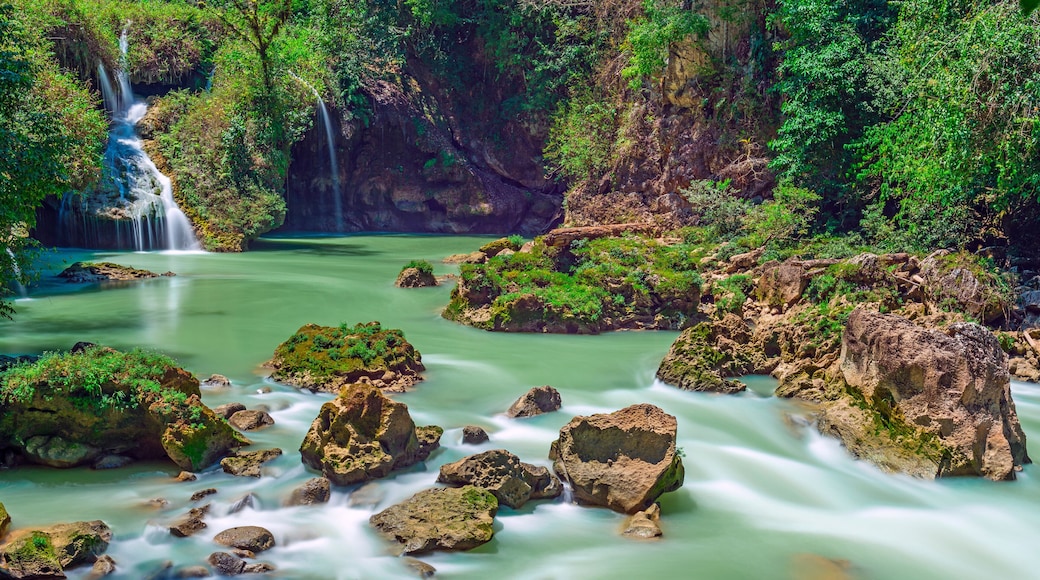 Long exposure panorama of the limestone ridge with cascades and waterfalls of Semuc Champey in the Peten jungle and rainforest of Guatemala.