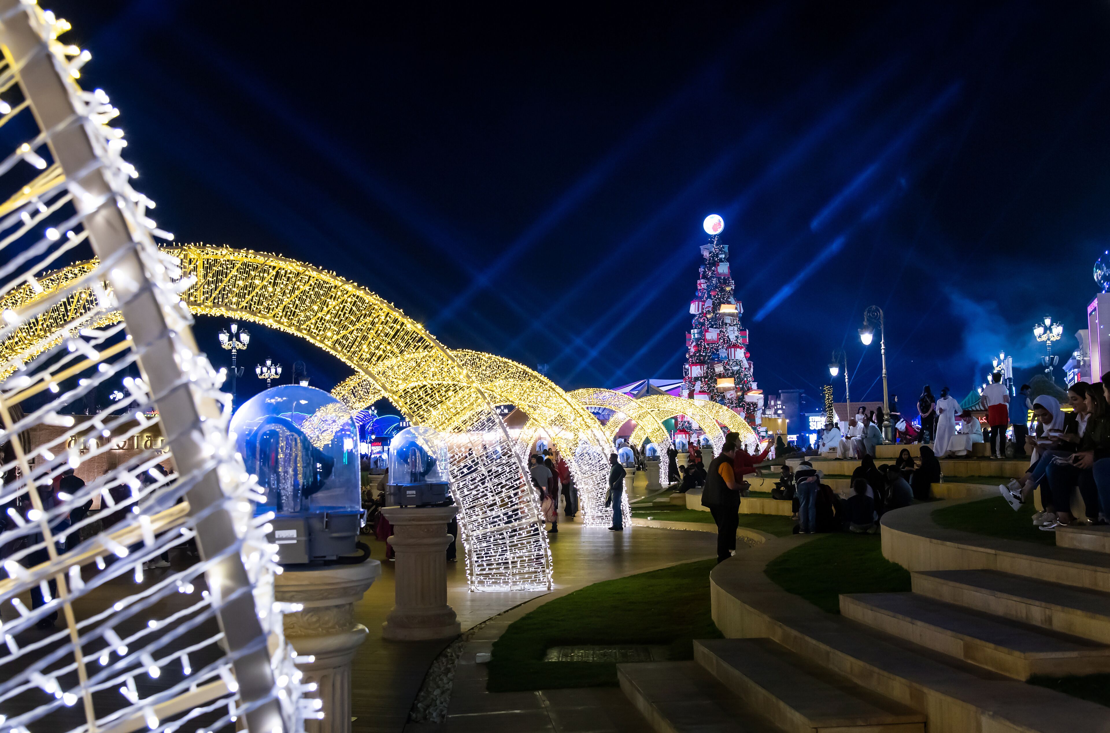 Global village with big Christmas tree and winter holidays decorations in Dubai