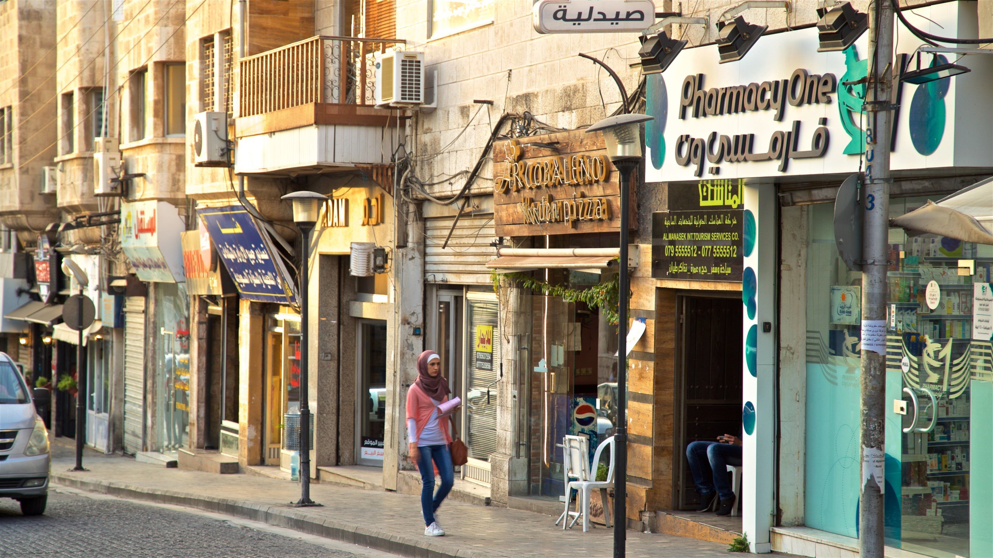 Rainbow Street showing street scenes as well as an individual femail
