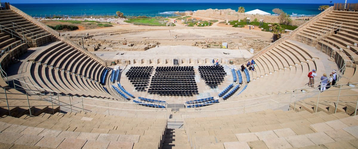 Caesarea Amphitheater featuring general coastal views and theater scenes