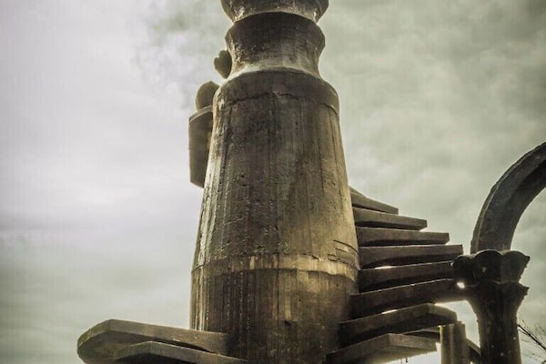 A pair of surrealistic stairs that lead nowhere, part of the amazing castle and garden designed by Edward James.