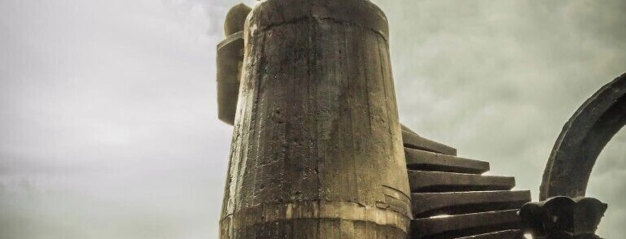 A pair of surrealistic stairs that lead nowhere, part of the amazing castle and garden designed by Edward James.