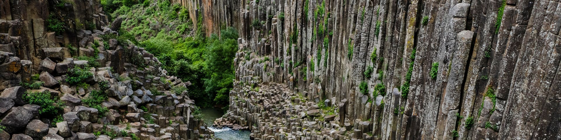Aerial view of prismas basalticos park with breathtaking basalt columns and a winding river, Huasca de Ocampo, Mexico.