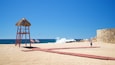 Playa Las Viudas which includes a sandy beach and general coastal views as well as an individual male