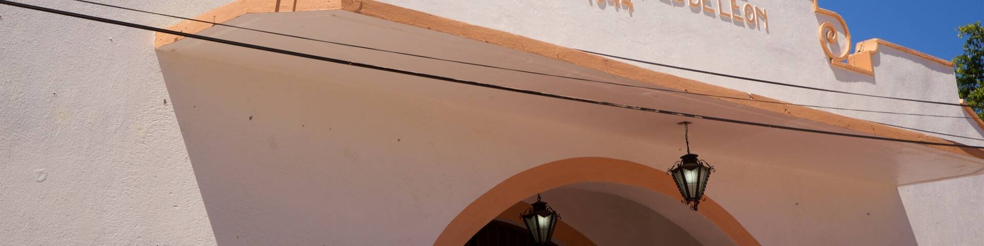 Teatro Marquez de Leon featuring signage