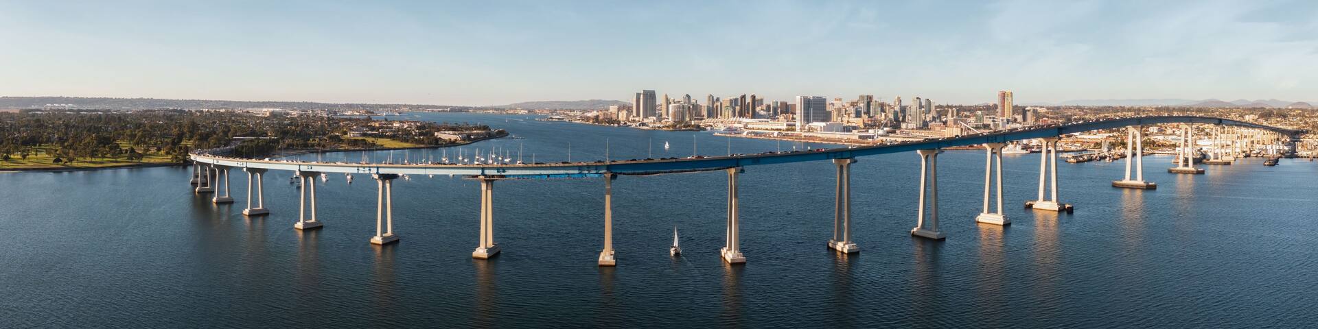 Coronado bridge with San Diego skyline in distance.