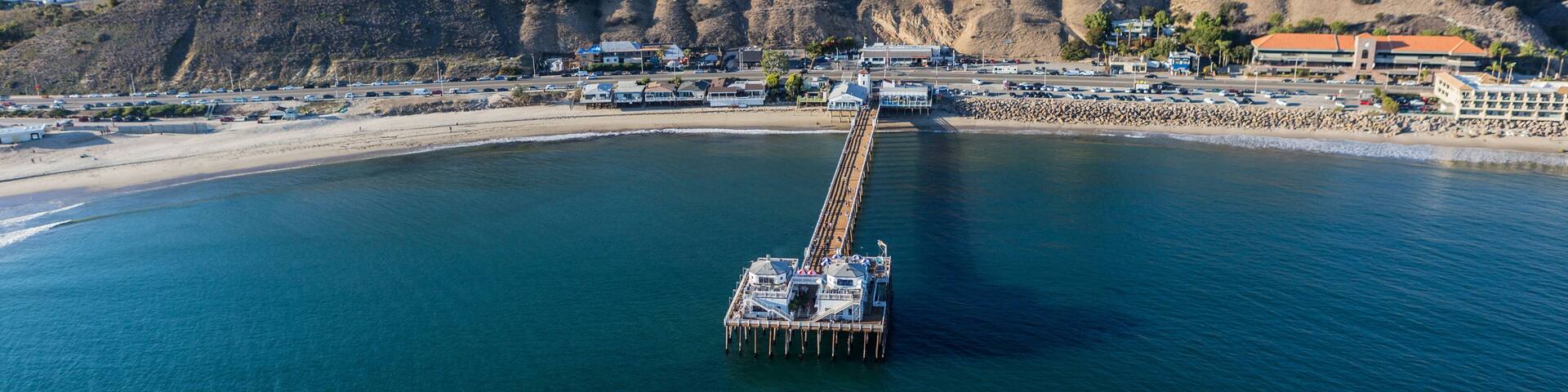 Aerial of Malibu Pier State Park and the Santa Monica Mountains