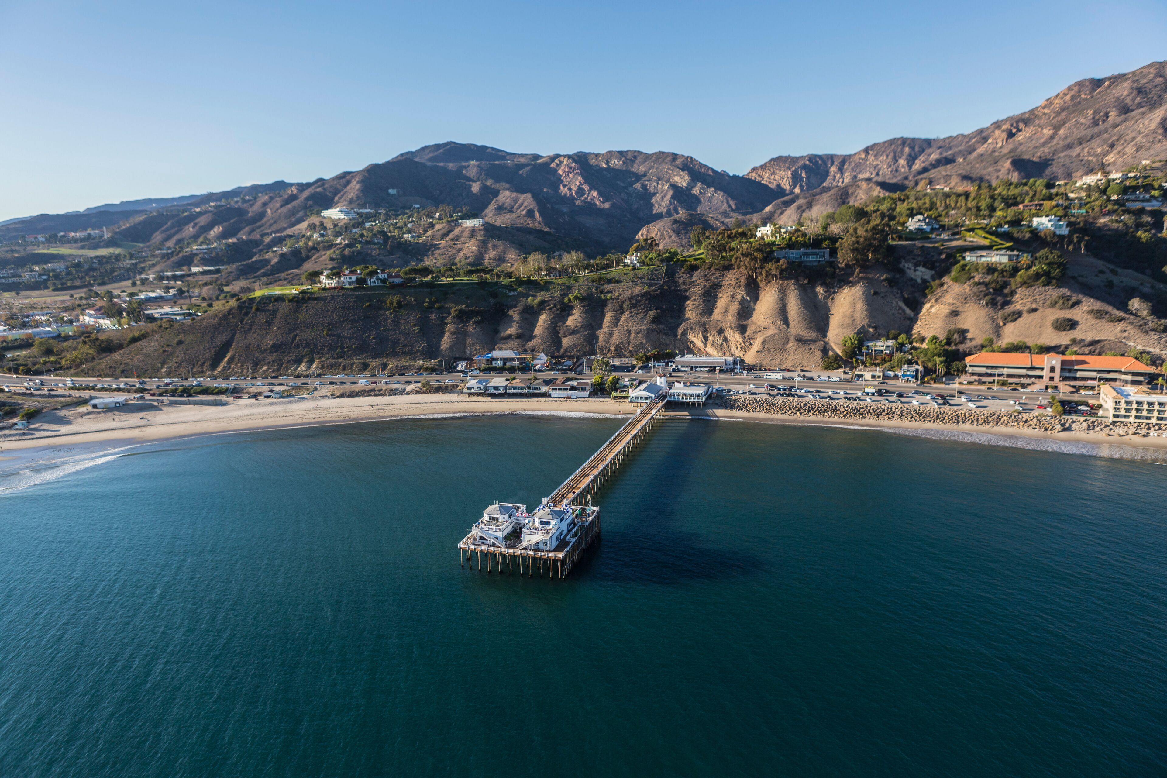 Aerial of Malibu Pier and the Santa Monica Mountains in Southern California