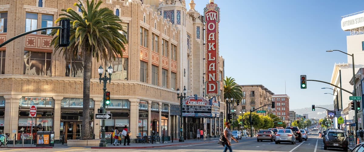 Fox Theater featuring a city, heritage elements and signage