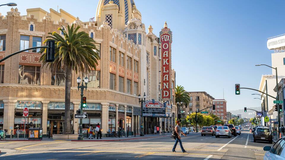 Fox Theater featuring a city, heritage elements and signage