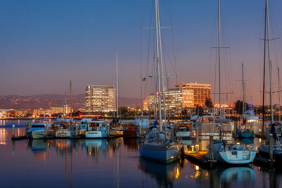 Emeryville, CA panorama at night. The beautiful harbor with the Berkeley Hills in  the background