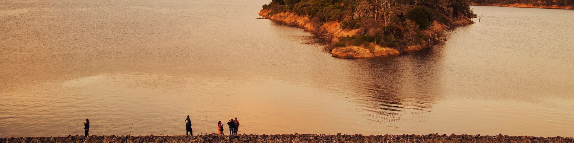 A beautiful background view of island on the big lake with people enjoying evening time around the lake at Mendocino California, USA
