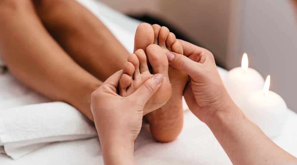 Pedicure and foot massage.Woman in a beauty salon for pedicure and foot massage.