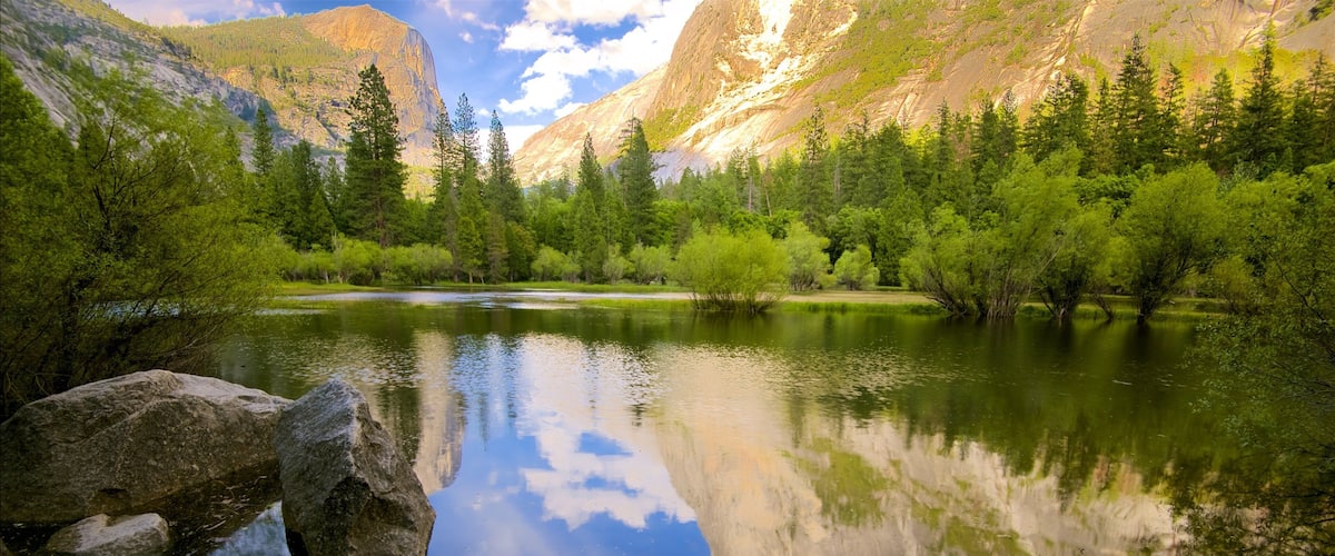 Yosemite National Park featuring tranquil scenes, mountains and a lake or waterhole
