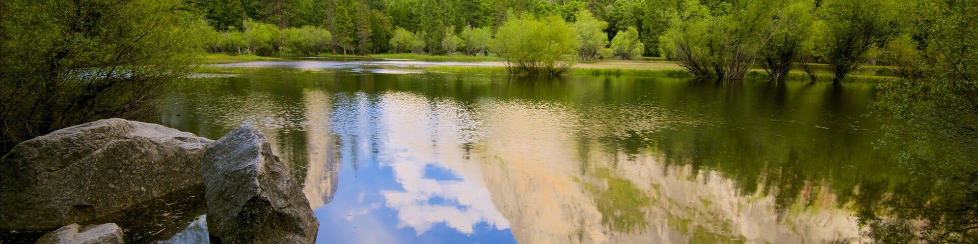 Yosemite National Park which includes mountains, tranquil scenes and a lake or waterhole