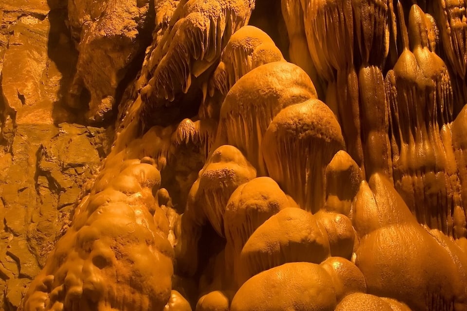 A cave with stalactites and stalagmites.