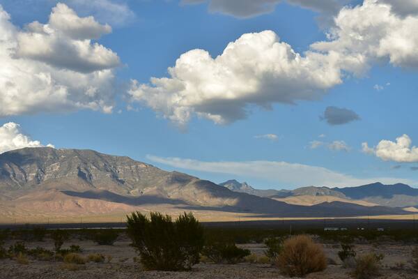 clouds over hills and mountain range Mojave Desert, Pahrump, Nevada, USA