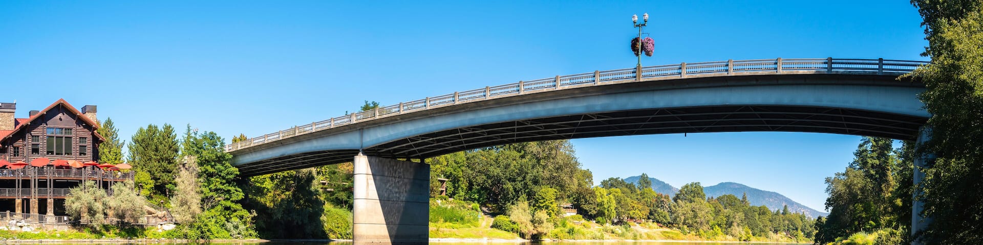 Riverside Park Bridge autumn landscape over Rogue River in Grants Pass, Josephine County, Oregon